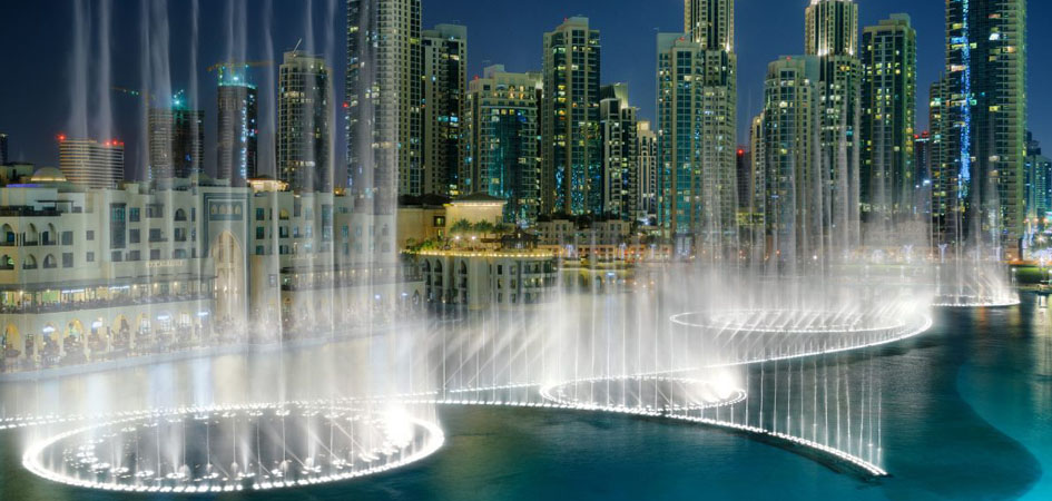 Dubai Fountain show with water jets and coloured lights