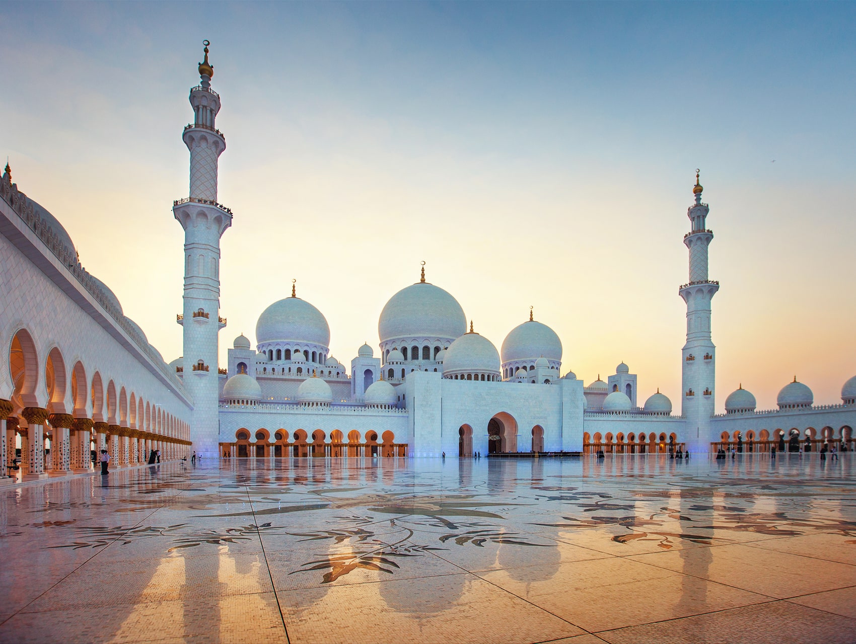 Jumeirah Grand Mosque white architecture against blue sky